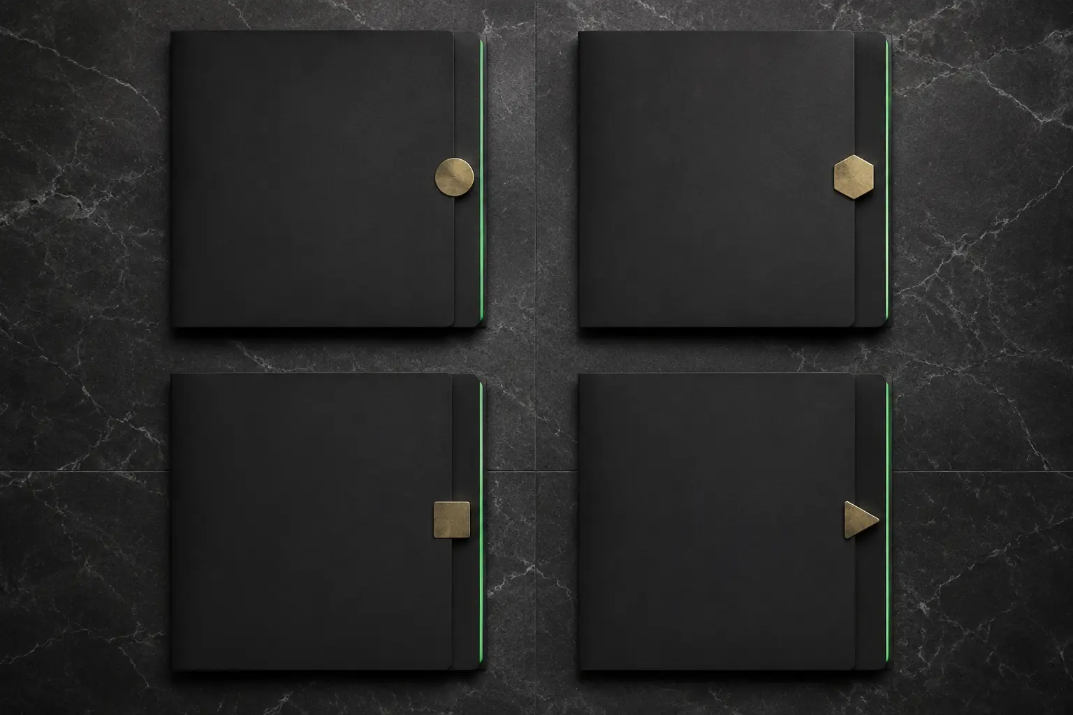 Four black proposal folders arranged in a precise grid with different brass markers